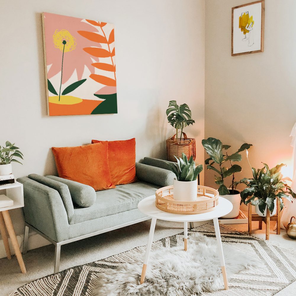 Boho Wohnzimmer : Faits saillants en orange et viele Pflanzen